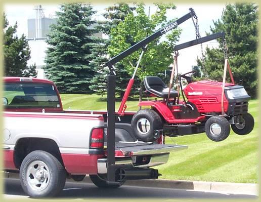 pluma gr&uacute;a grua gruas levantar cargas pickup pesos tambores hithch hoist clark clarck empresas fletes transporte incapacidad dolor espalda seguros levante colocaci&oacute;n cargas pesadas movimiento espa&ntilde;a latornoamerica argentina importaci&oacute;n cintura faja estiba weight lifting